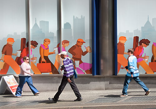 People walking in front of mural at Dunkin' Donuts, Pittsburgh, PA