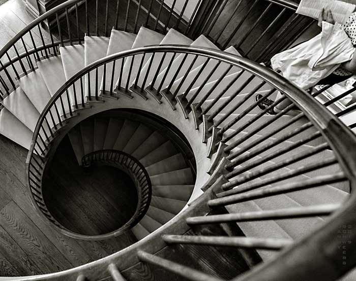 Photo of spiral staircase in the Electra Havemeyer Webb Memorial Building, Shelburne Museum, Vermont by Danny N. Schweers.
