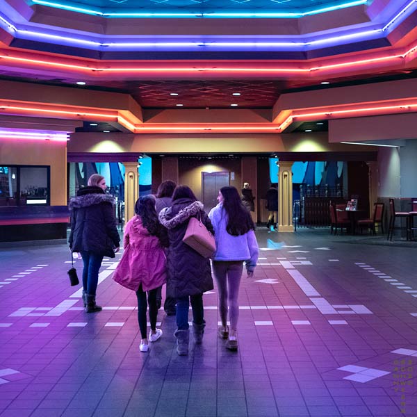 Five women leaving the Regal Brandywine Town Center movie theater, Wilmington, Delaware after watching a screen adaptation of Little Women; photo by Danny N. Schweers, copyright 2020
