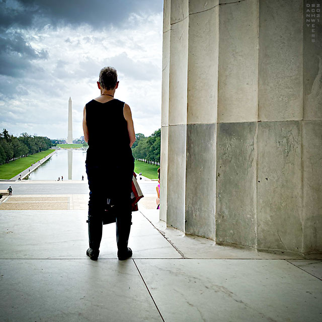 Photo of a woman looking east from the Lincoln Memorial towards the Washington Monument, Washington, D.C. copyright 2021 by Danny N. Schweers.