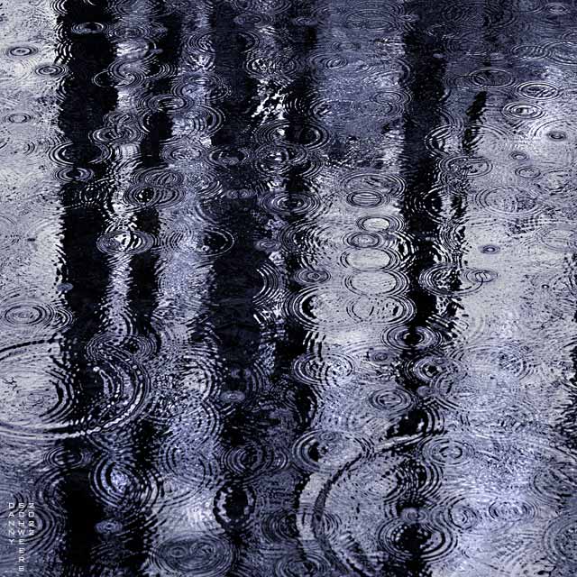 Photo of rain falling on Naamans Creek, Arden, Delaware, copyright 2022 by Danny N. Schweers.